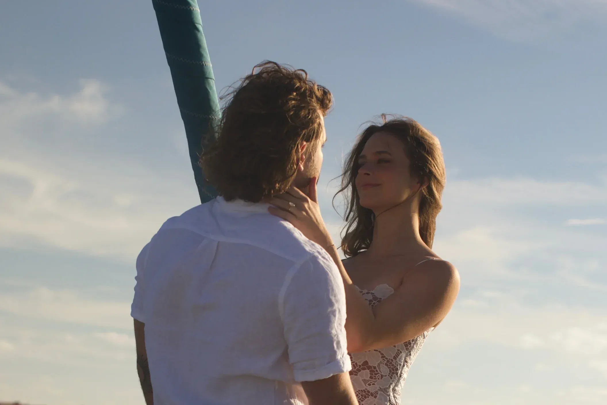 Newly engaged couple aboard SV Cay Michele